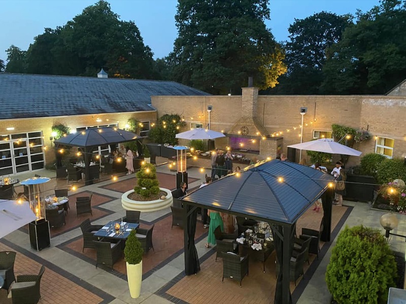 Outdoor dining and bar area at Eastwood Hall in Nottingham